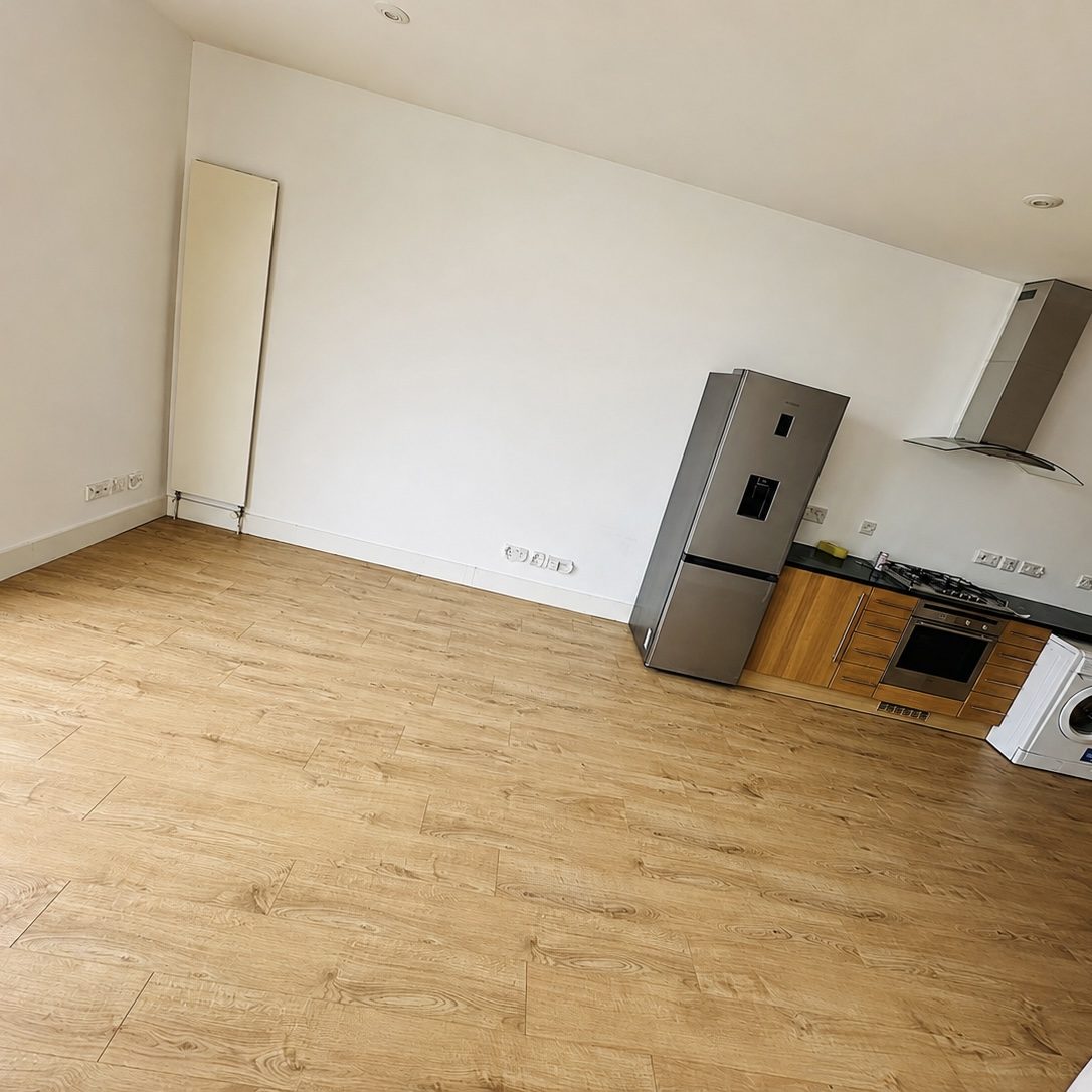Light engineered oak flooring in a large kitchen and living area