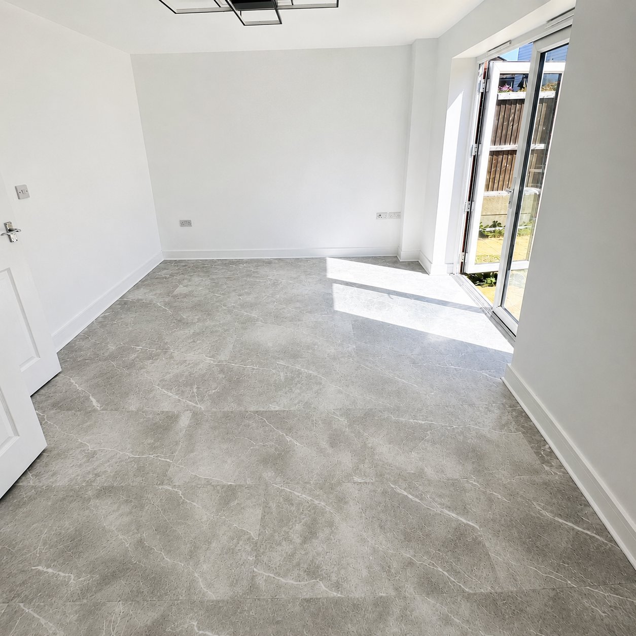 Marble-effect LVT flooring professionally fitted in London
