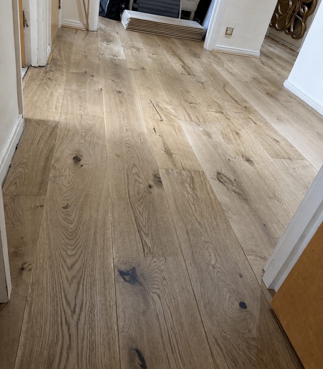 Knotted rustic oak engineered flooring in a hallway, Fulham
