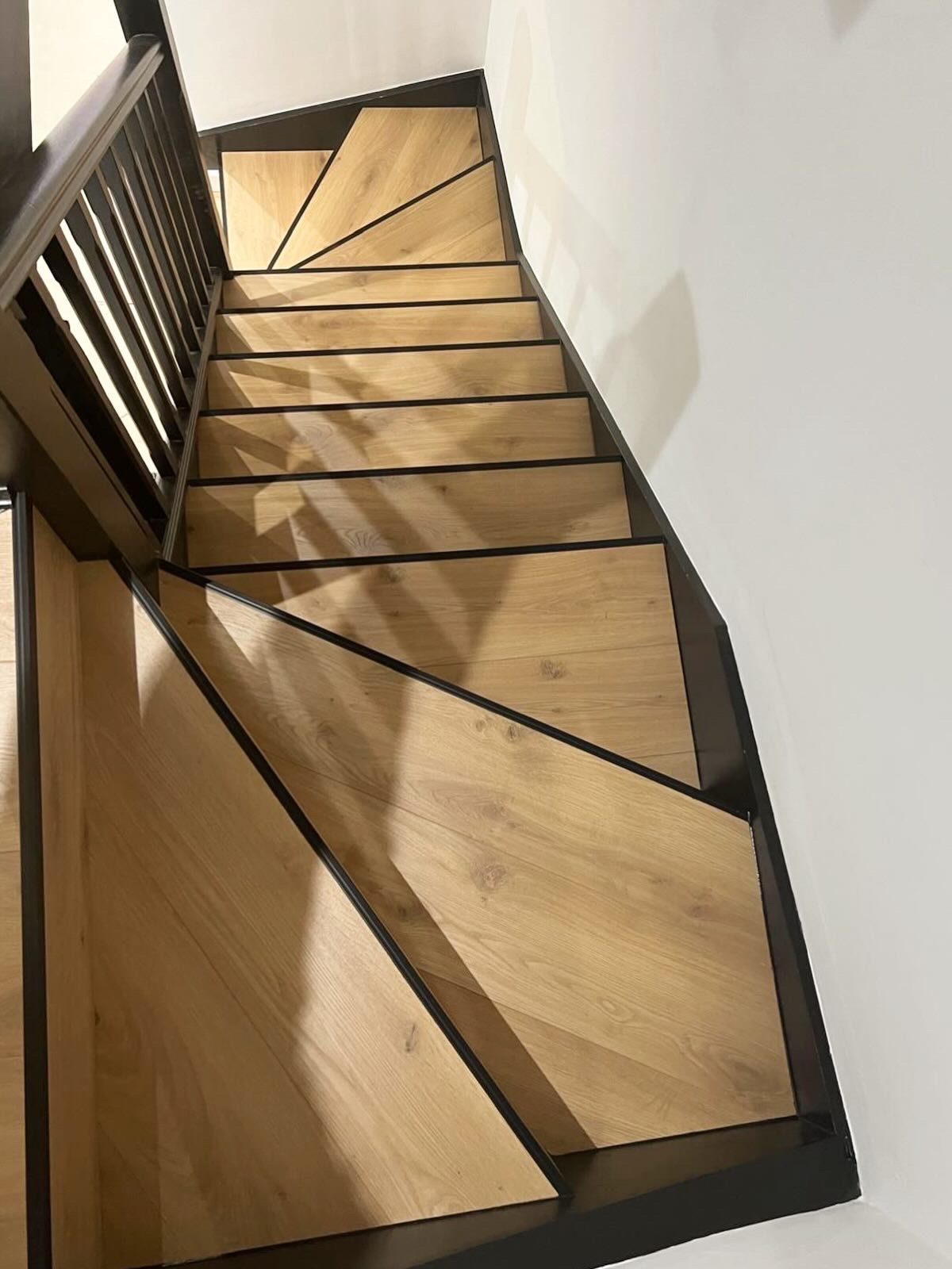 Oak staircase treads fitted throughout a London home
